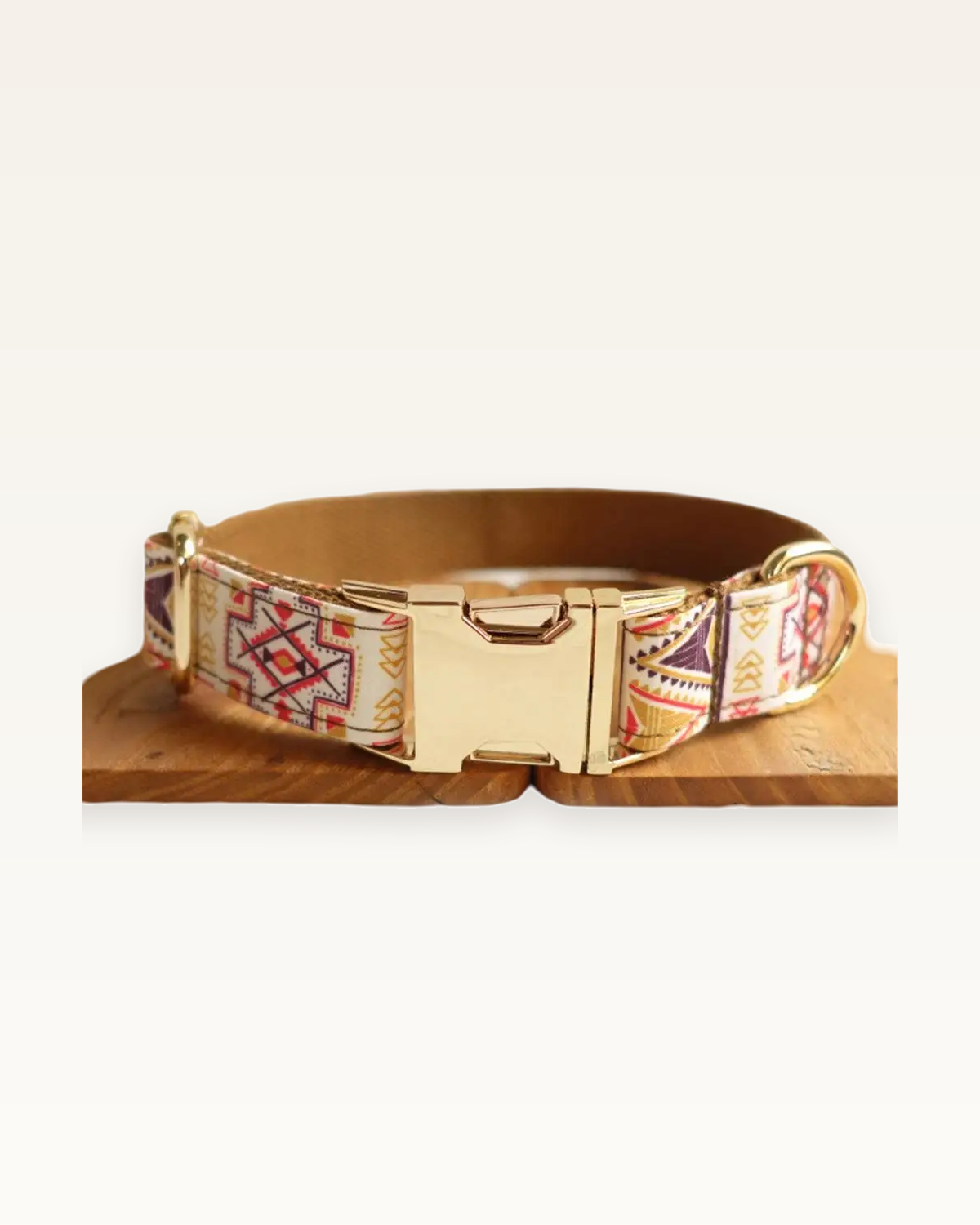 Boho Chic dog collar with gold hardware on a warm ivory background