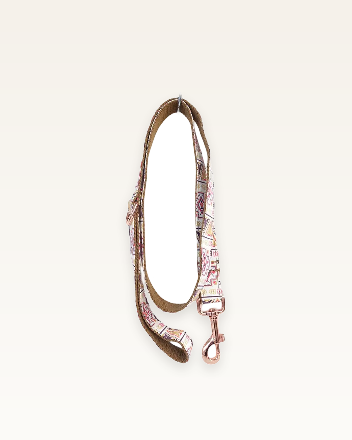 Boho Chic dog leash with rose gold hardware on a warm ivory background