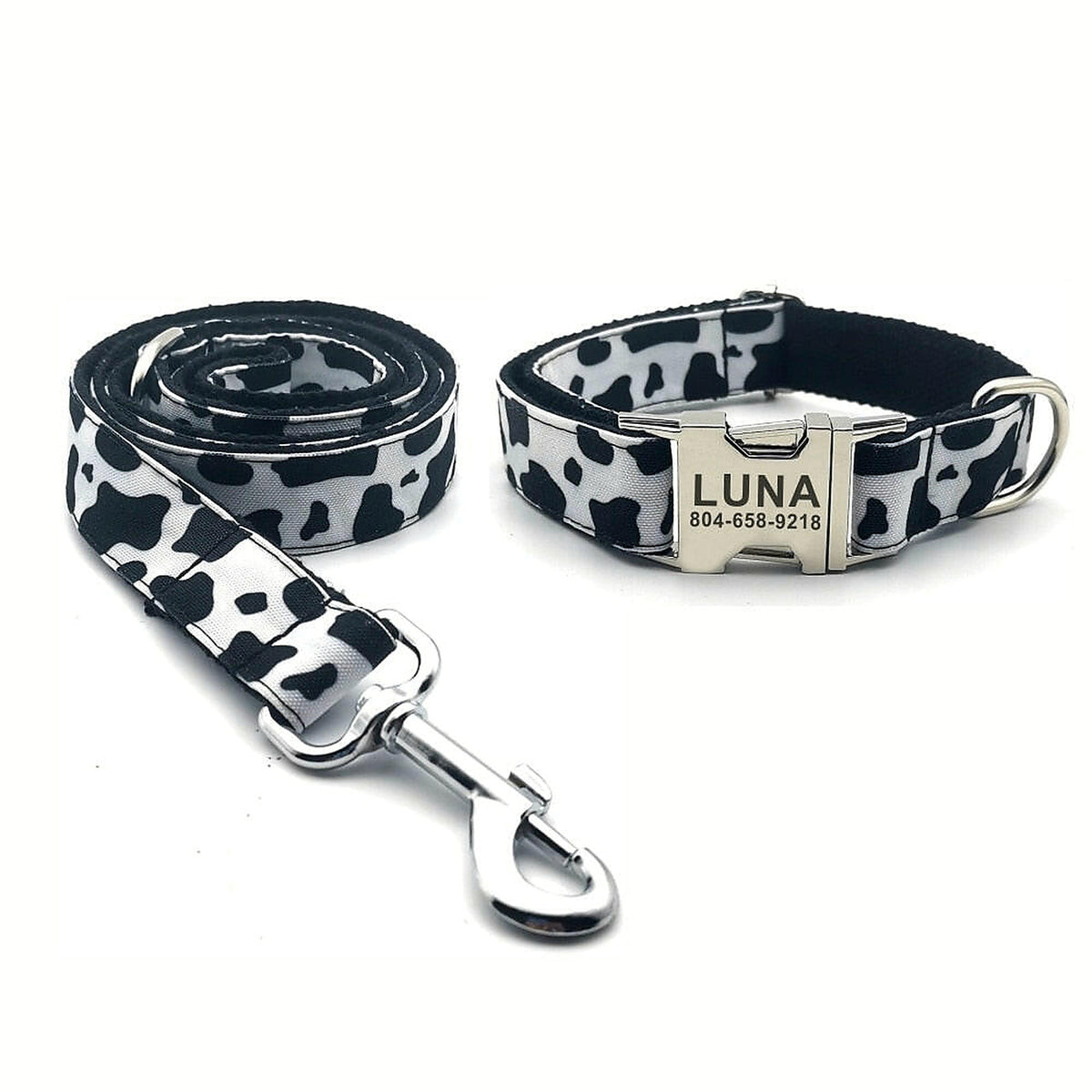 Cowhide Couture collar and leash set in black-and-white cow print with silver-tone hardware.