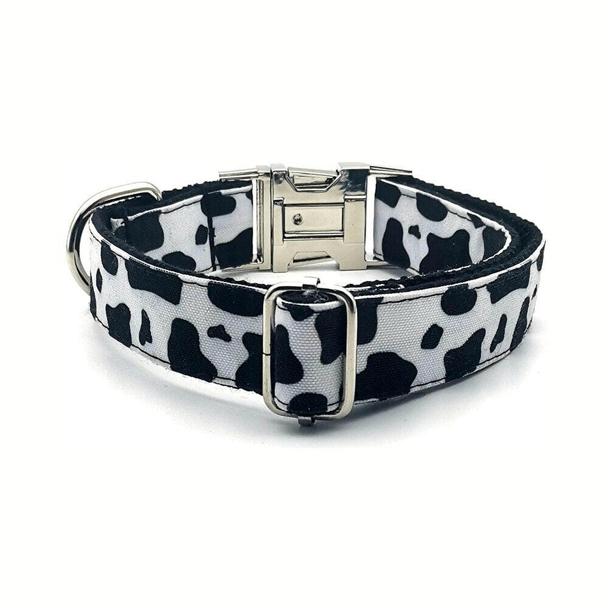 Cowhide Couture dog collar detail showing adjustable strap and silver-tone hardware.
