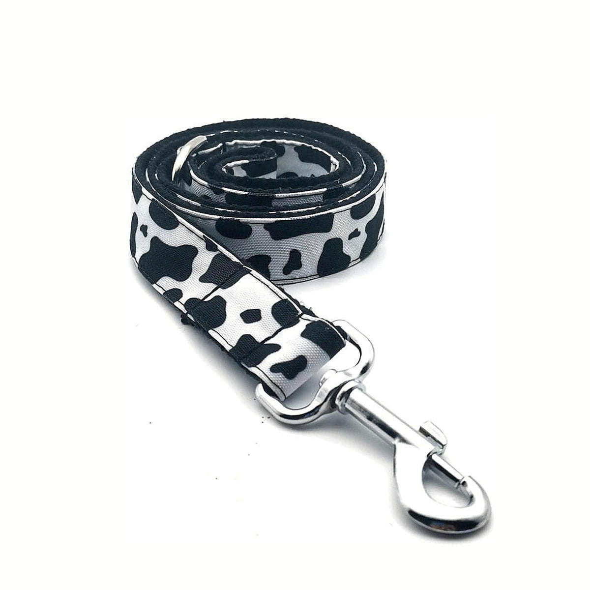 Cowhide Couture matching leash in black-and-white cow print with silver-tone clasp.