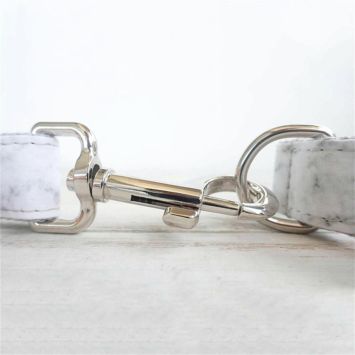 Marble Marvel silver clasp detail in Barkin’ Hound Luxury 2.0 presentation